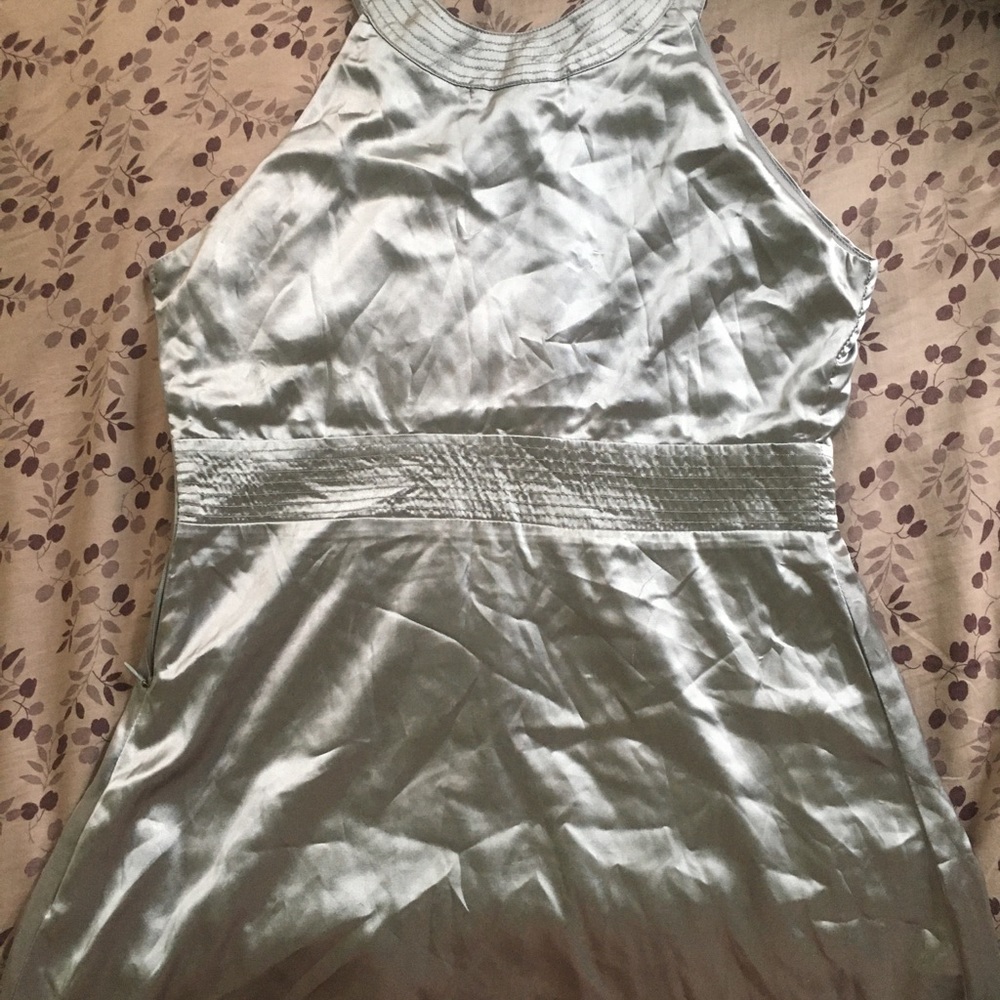 Soft and silky silver top. Size: 6